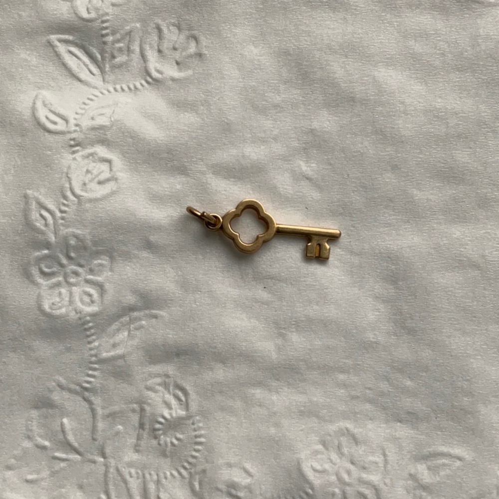10k yellow gold key pendant or charm.